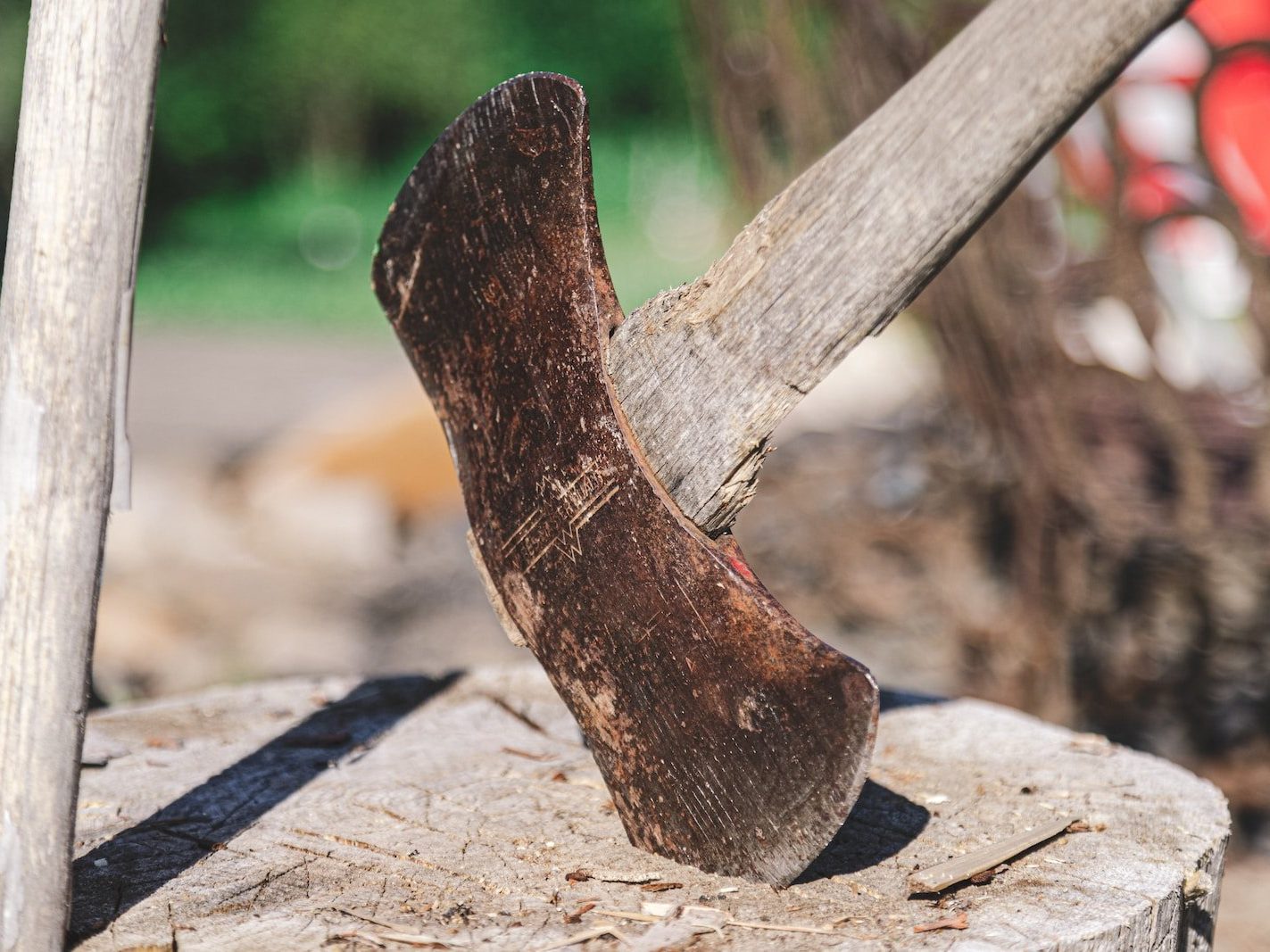 an old shoe is sitting on a piece of wood